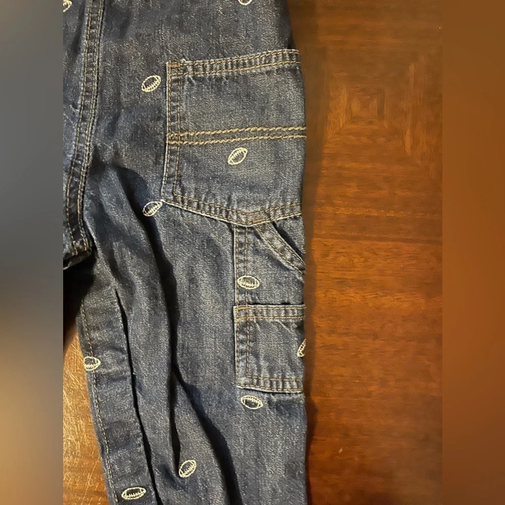 OshKosh B’Gosh | Denim Overalls with Footballs | 18 mo
